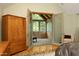 Bedroom with French doors to screened-in porch at 267 Bald Eagle Dr, Pittsboro, NC 27312