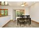 Dining room featuring a wood table and black chairs in an area with tiled floors and natural light at 267 Bald Eagle Dr, Pittsboro, NC 27312