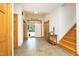 Inviting foyer with tile flooring, wooden accents, and an open doorway to the outdoors at 267 Bald Eagle Dr, Pittsboro, NC 27312