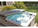 Close-up of a pristine hot tub, set in a serene backyard environment, perfect for relaxation and rejuvenation at 267 Bald Eagle Dr, Pittsboro, NC 27312