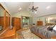 Vaulted ceiling and hardwood floors with views to the screened porch at 267 Bald Eagle Dr, Pittsboro, NC 27312