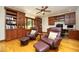 Office space with built-in bookshelves, hardwood floors, recessed lighting, and comfortable seating at 267 Bald Eagle Dr, Pittsboro, NC 27312