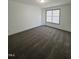 Spacious bedroom offers plush carpet and a large window for natural light at 2907 S S Roxboro St, Durham, NC 27707