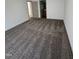 Bedroom boasting plush carpet and access to the en suite bathroom at 2907 S S Roxboro St, Durham, NC 27707