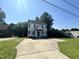 View of the house, ample parking, and proximity to neighborhood amenities at 2907 S S Roxboro St, Durham, NC 27707
