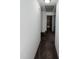 Hallway features neutral paint, carpet, and access to other rooms at 2907 S S Roxboro St, Durham, NC 27707
