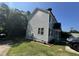 The home's vinyl siding and manicured lawn enhance curb appeal and offer durability at 2907 S S Roxboro St, Durham, NC 27707