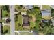 Overhead shot showing a well maintained property with verdant greenery and manicured lawns at 315 Crescent Dr, Clayton, NC 27520