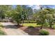 A well-maintained lawn and thoughtful landscaping enhance the curb appeal of this charming property at 315 Crescent Dr, Clayton, NC 27520