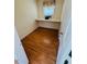 Small office area with a built-in desk and a window bringing in light at 315 Crescent Dr, Clayton, NC 27520