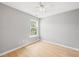Simple bedroom with wood floors and a ceiling fan at 3201 Sawyers Mill Dr, Apex, NC 27539