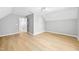 Spacious bedroom featuring light wood floors and fresh neutral paint at 3201 Sawyers Mill Dr, Apex, NC 27539