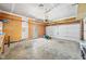The garage features exposed plywood interior walls and a new garage door opener at 3201 Sawyers Mill Dr, Apex, NC 27539