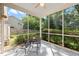 This screened porch offers space to relax and enjoy views of the backyard at 3201 Sawyers Mill Dr, Apex, NC 27539