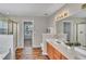 Bathroom with a double sink vanity, separate shower stall, and a neutral color scheme at 3212 Marblewood Ct, Raleigh, NC 27604