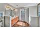 Bathroom featuring double sinks, a combination shower/tub, and modern fixtures at 3212 Marblewood Ct, Raleigh, NC 27604