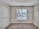 Walk-in closet with shelving and a window, providing organized storage and natural light at 3212 Marblewood Ct, Raleigh, NC 27604