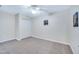 Bedroom featuring plush carpet, a ceiling fan, and a closet, providing ample storage space and a relaxing atmosphere at 325 Millet Dr, Morrisville, NC 27560