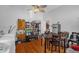 Spacious laundry room including appliances, mini fridge, and eat-in space at 401 N Main St, Louisburg, NC 27549