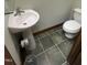 Bathroom with pedestal sink and toilet at 4070 Swannie Coble Rd, Snow Camp, NC 27349