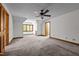 Bright, spacious bedroom with carpeted floors and a ceiling fan at 4070 Swannie Coble Rd, Snow Camp, NC 27349