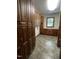 Spacious laundry room with wood cabinets at 4070 Swannie Coble Rd, Snow Camp, NC 27349