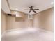 Neutral-toned finished basement with carpet and painted cinder block walls at 4517 Gates St, Raleigh, NC 27609