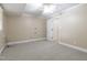 View of the spacious basement bedroom with neutral paint and carpet at 4517 Gates St, Raleigh, NC 27609