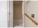 Basement shower with glass doors and a grab bar at 4517 Gates St, Raleigh, NC 27609