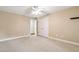 Spacious bedroom with neutral walls, white trim, and plush carpet at 4517 Gates St, Raleigh, NC 27609