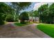 Beautiful home with mature landscaping and a circular driveway at 4517 Gates St, Raleigh, NC 27609