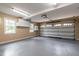 Spacious garage with epoxy floors and abundant overhead storage at 4517 Gates St, Raleigh, NC 27609