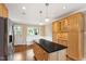 Bright and airy kitchen featuring a center island, stainless fridge, and eating nook at 4517 Gates St, Raleigh, NC 27609