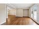 Bright living room featuring hardwood floors and French doors at 4517 Gates St, Raleigh, NC 27609