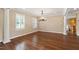 Spacious Living Room with hardwood floors and plantation shutters at 4517 Gates St, Raleigh, NC 27609