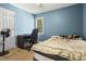 Cozy bedroom with lots of natural light and a dedicated desk space at 5105 Baywood Forest Dr, Knightdale, NC 27545