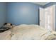 Simple bedroom with neutral wall color and ample natural light at 5105 Baywood Forest Dr, Knightdale, NC 27545