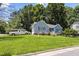 Beautiful home with lush lawn and mature trees in a quiet residential neighborhood at 5105 Baywood Forest Dr, Knightdale, NC 27545