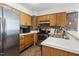 Functional kitchen boasts stainless steel appliances and ample counter space at 5105 Baywood Forest Dr, Knightdale, NC 27545