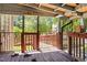 Outdoor porch with wooden deck and view of greenery at 5105 Baywood Forest Dr, Knightdale, NC 27545