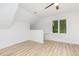 Bright bedroom features wood floors, natural light, and neutral decor, creating a relaxing atmosphere at 5217 West Oaks Dr, Fuquay Varina, NC 27526