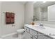 Bright bathroom features a white vanity, ample counter space, and modern fixtures at 67 Little Leaf Ln # 98, Clayton, NC 27527