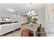 Living and dining areas providing an open floor plan, great for entertaining at 67 Little Leaf Ln # 98, Clayton, NC 27527