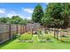 Backyard featuring a animal pen with vegetable garden at 73 Lynnville Ct, Lillington, NC 27546