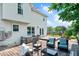 Outdoor deck with seating area, grill, and access to a backyard playset for entertainment at 73 Lynnville Ct, Lillington, NC 27546