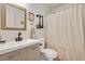 Modern bathroom featuring a stylish vanity, matte black finishes, and a shower with curtain at 73 Lynnville Ct, Lillington, NC 27546