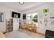 Bright and inviting playroom with natural light, featuring desks, organization, and playful decor at 73 Lynnville Ct, Lillington, NC 27546