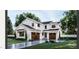 Stunning two-story home with a modern farmhouse design, featuring white siding and a two-car garage at 8014 Penny Rd, Raleigh, NC 27606