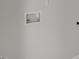 Close up of a wall with water connections, electrical outlets, and a white paint finish at 813 Old Tarboro Rd, Wendell, NC 27591
