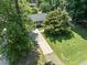 Charming home with well-manicured lawn and mature shade trees offers a serene setting at 908 Clarion Dr, Durham, NC 27705